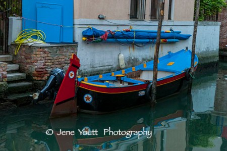 venice canal blue boat